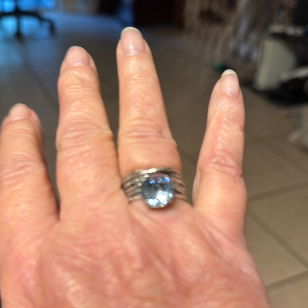 Elegant Silver Band with Blue Gemstone